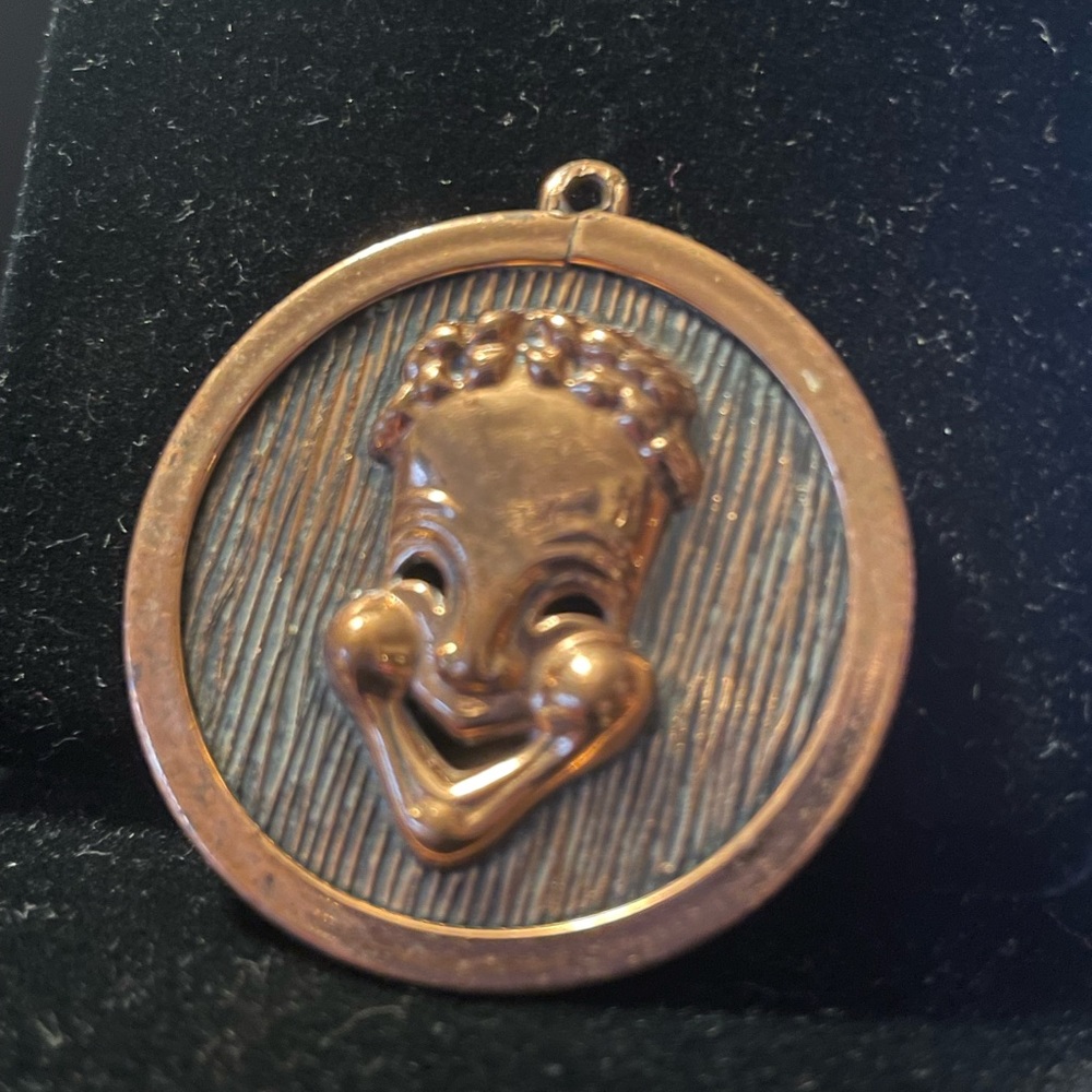 Embossed Happy face/Sad face copper colored metal coin pendant